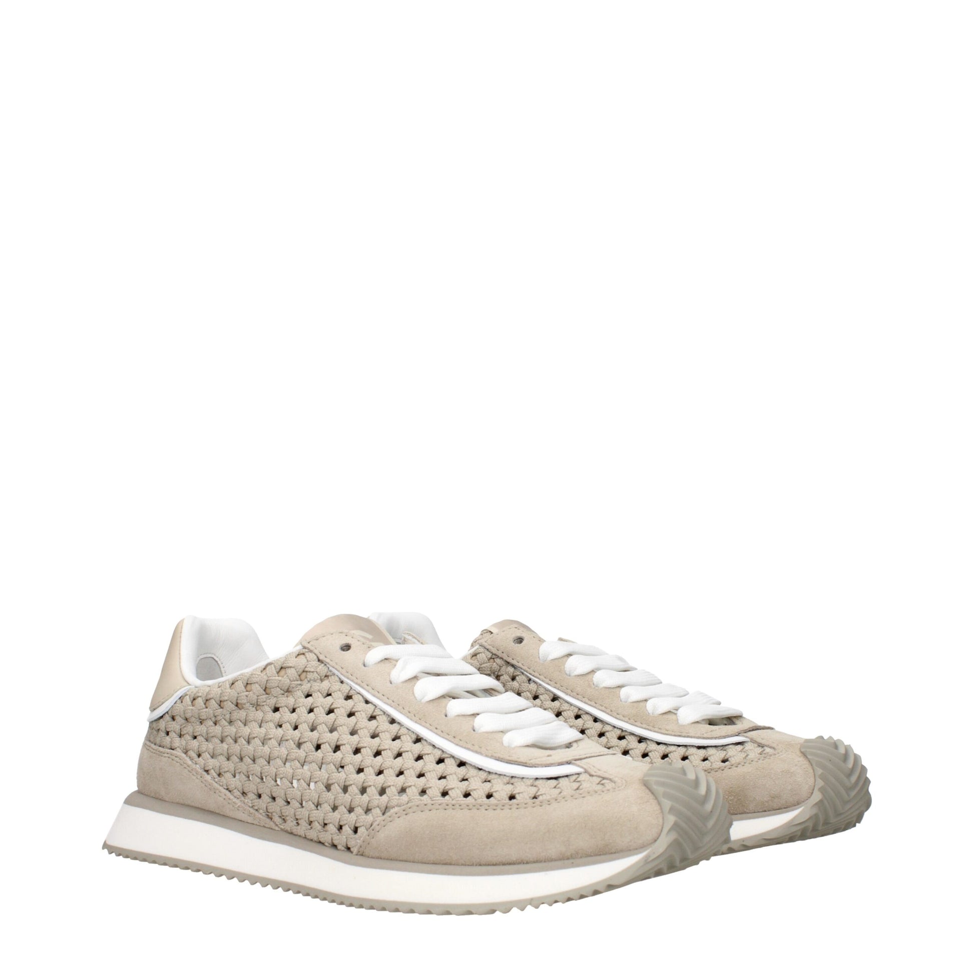 Tan suede sneakers with embossed logo, laces and side stripe