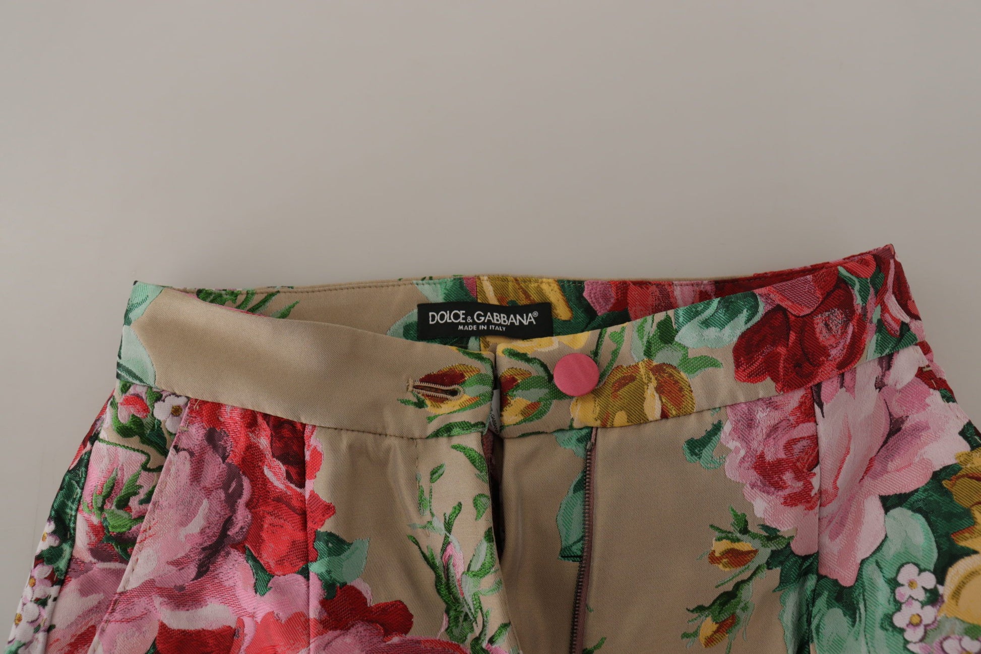 A pair of high waist floral print trousers by Dolce & Gabbana
