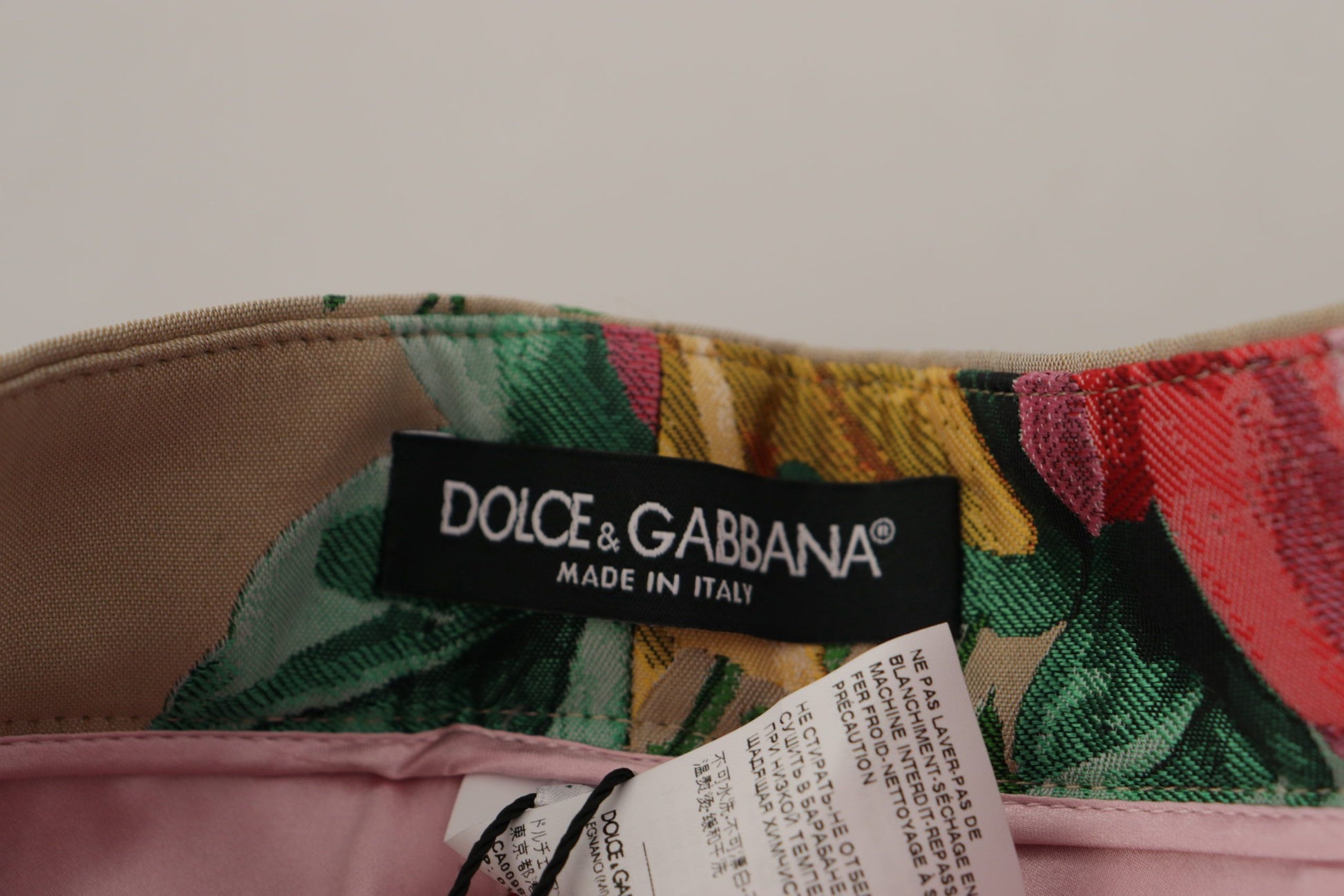 A pair of high waist pants with a floral pattern from the brand Dolce & Gabbana