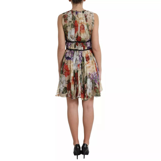 This is a beige floral sleeveless A-line mini dress