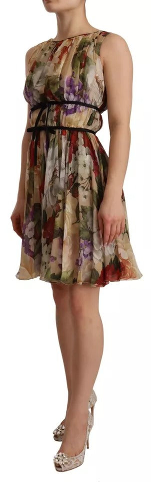 A sleeveless, round neck mini dress with floral pattern and beige color