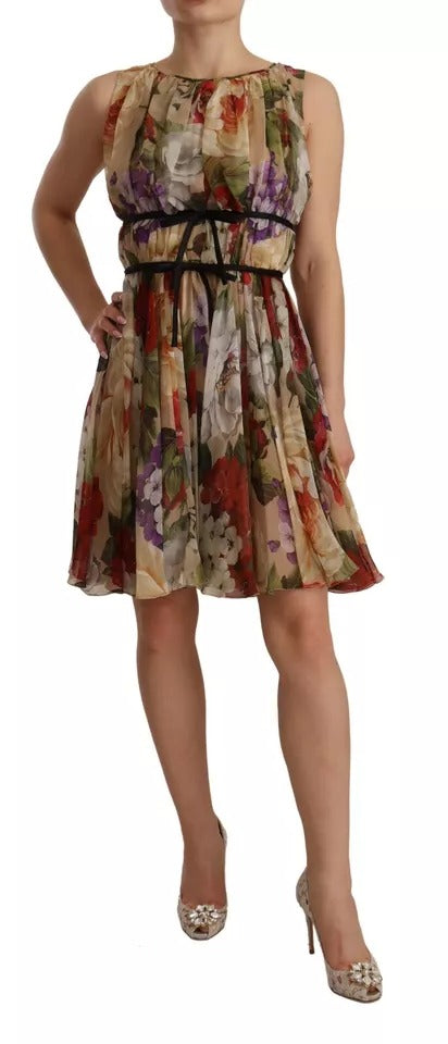 A sleeveless, round neck mini dress with a floral pattern