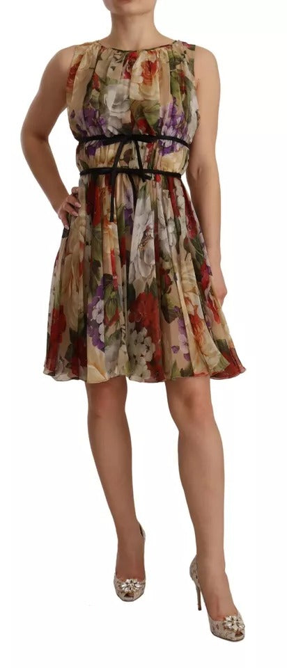 A sleeveless, round neck mini dress with a floral pattern