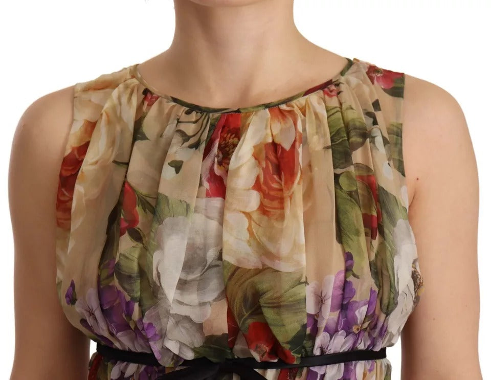 A sleeveless, round neck mini dress with floral pattern and beige color