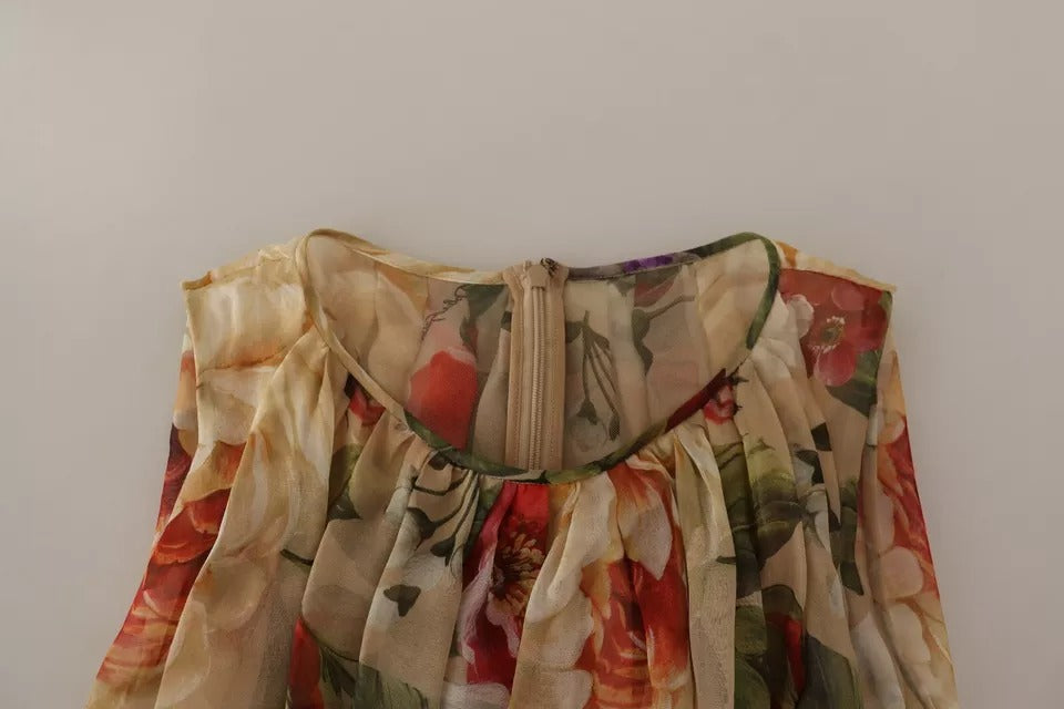 A beige floral sleeveless round neck mini dress by Dolce & Gabbana