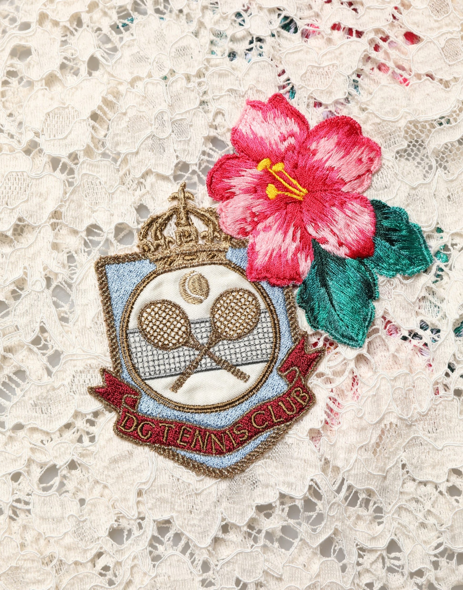 Embroidered emblem on fabric