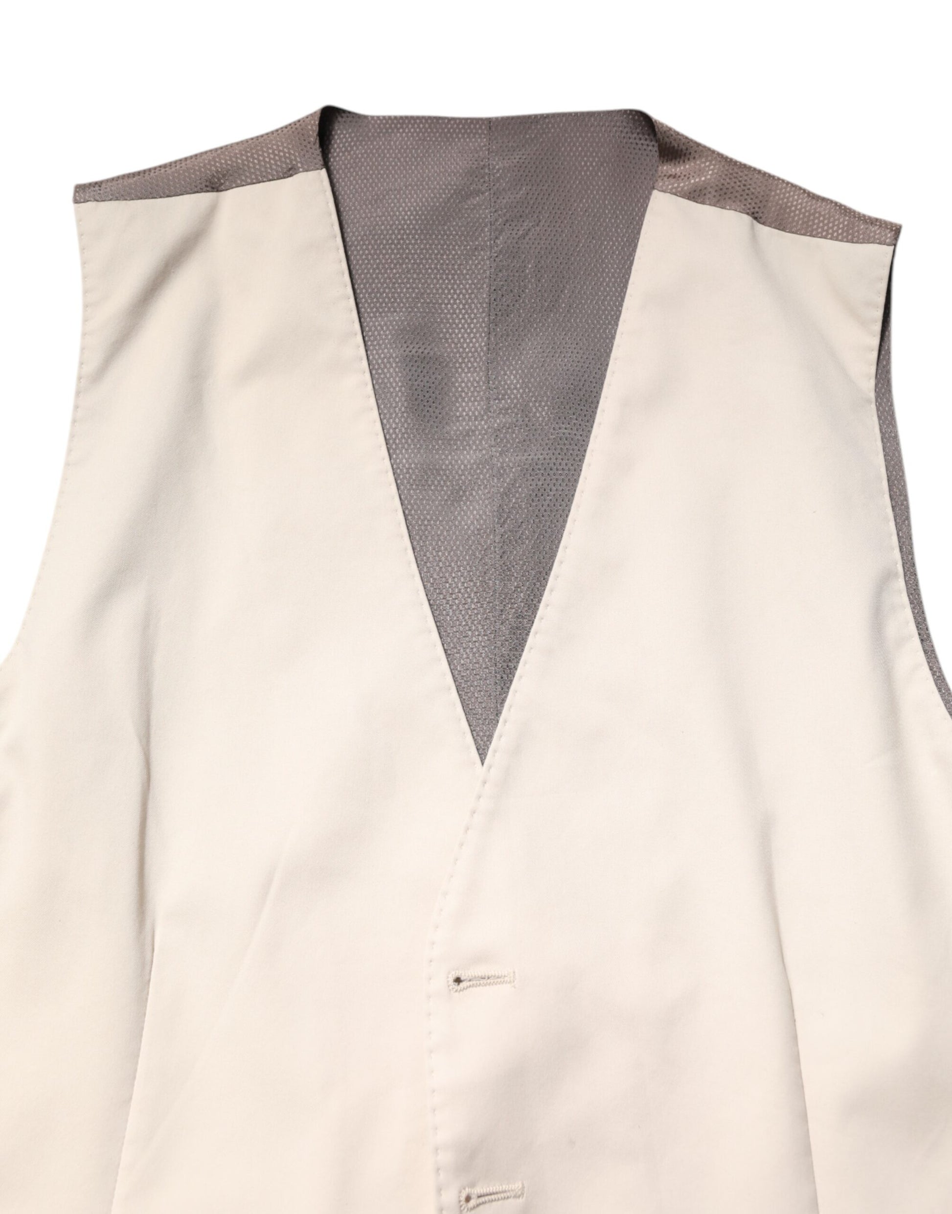 A beige gray vest with a lapel and button closure, part of a formal men's suit