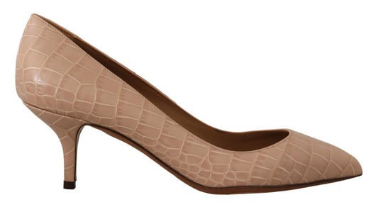 Pair of women's high heel shoes with pointed toe and embossed texture on vamp