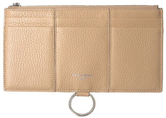 Brown leather wallet with a silver ring attached to the top