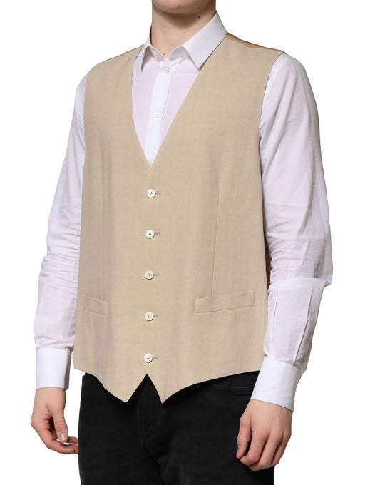 A beige linen vest with white buttons, part of a formal men's suit