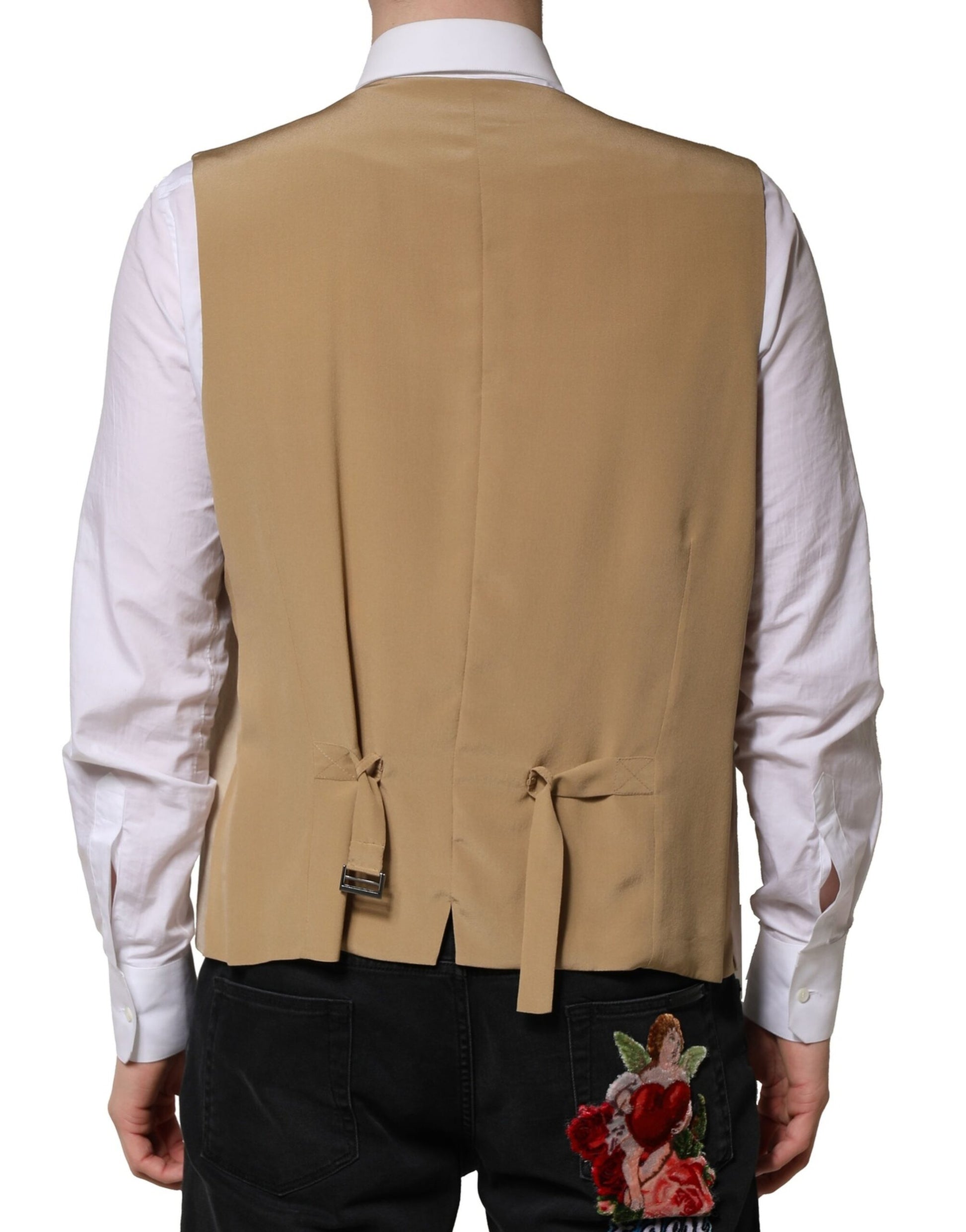 A beige linen vest with a bow tie detail, part of a formal men's suit