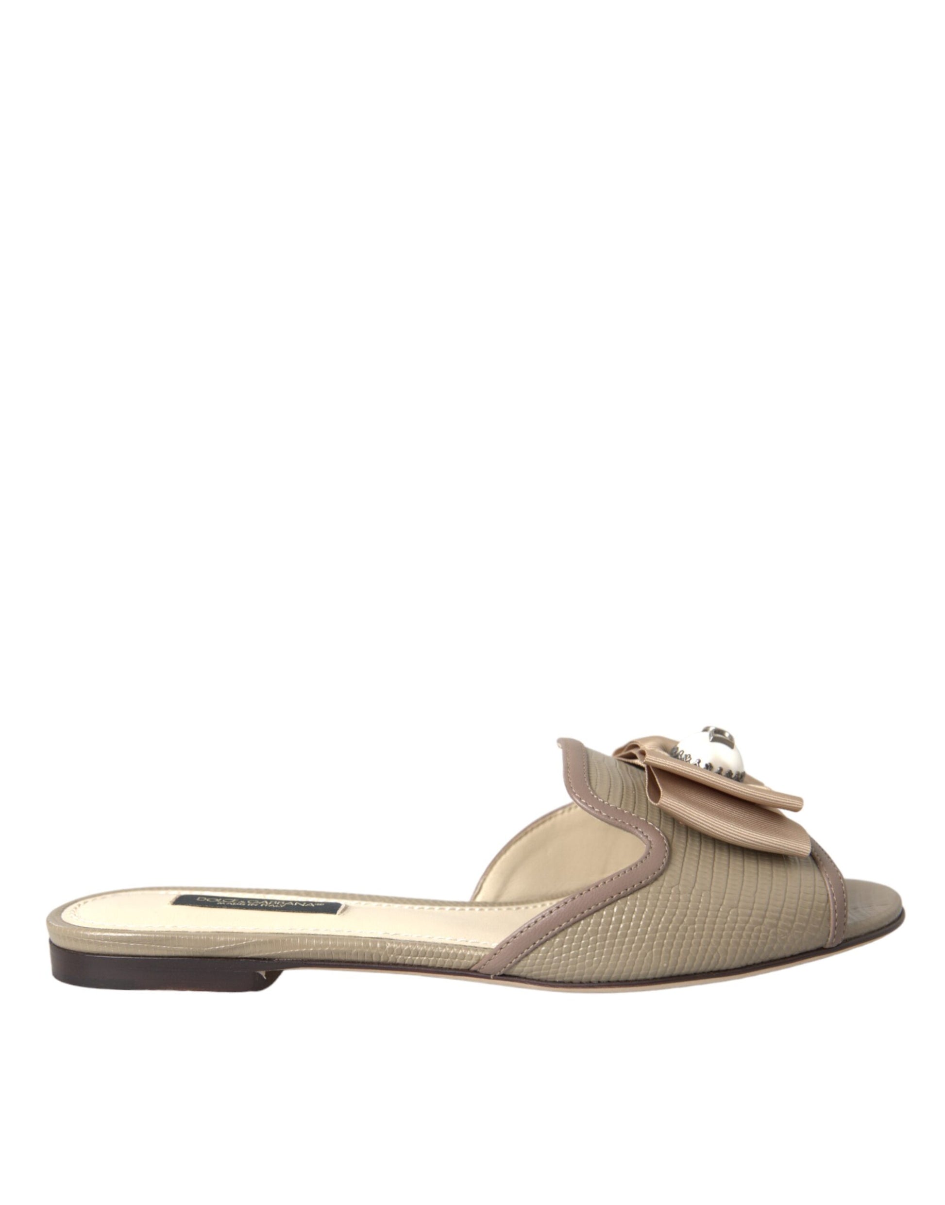 Tan women's slide sandal with embellishment on toe