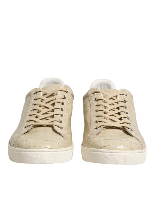 Pair of tan sneakers with lace closure