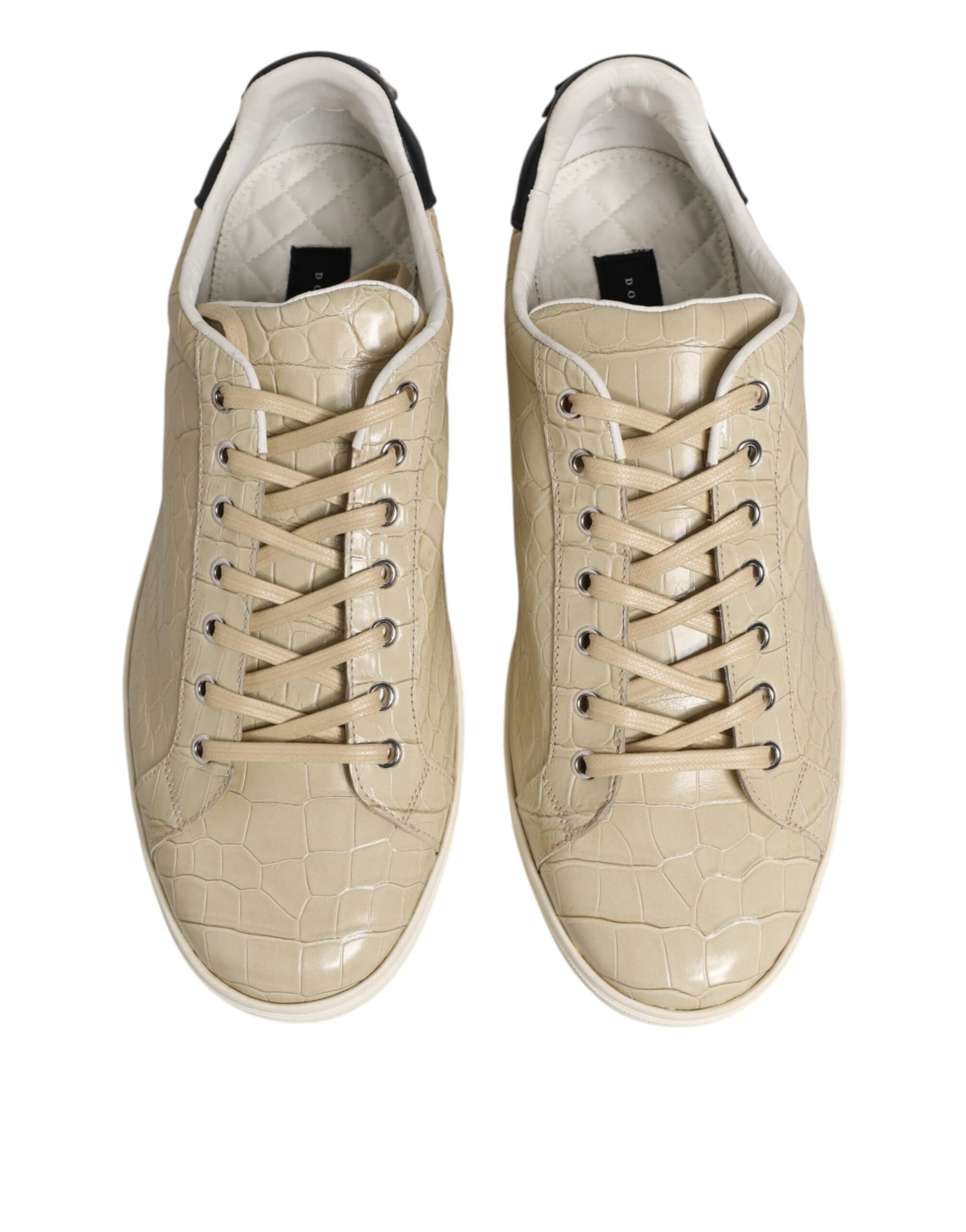 Pair of tan sneakers with crocodile skin texture on sides