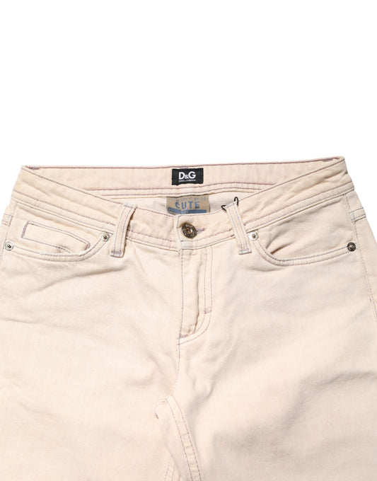 Pair of light beige women's jeans with visible brand label on waistband