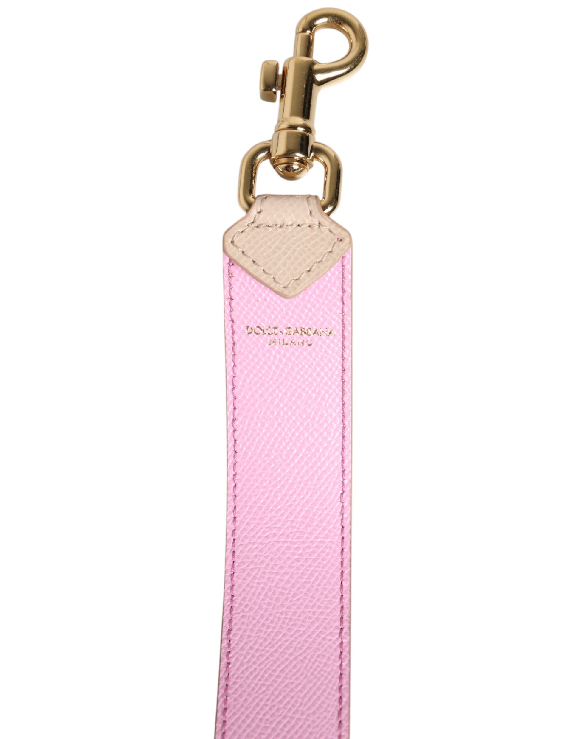 Pink keychain with gold chain and tag