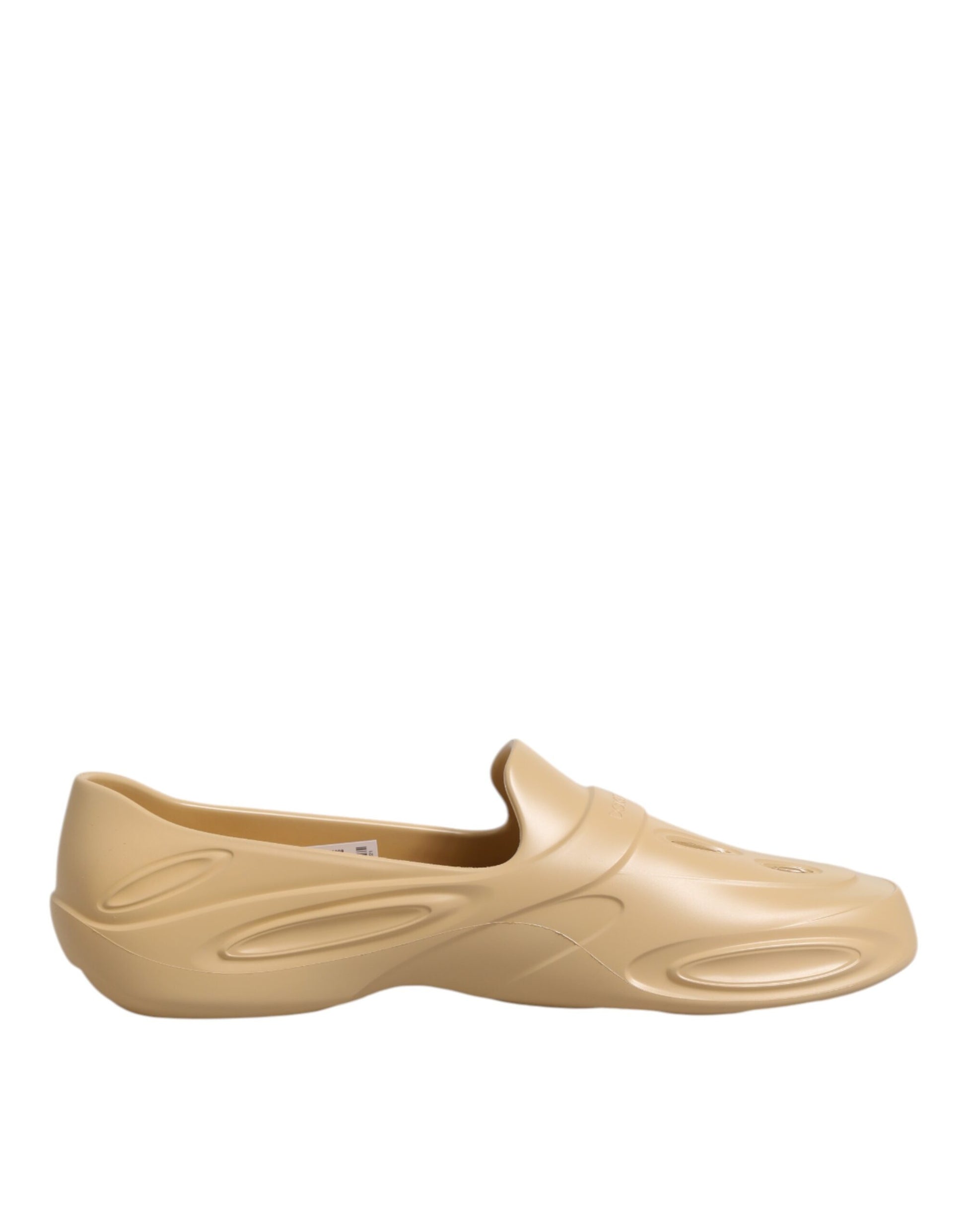 Tan water shoe with ridges on bottom for grip