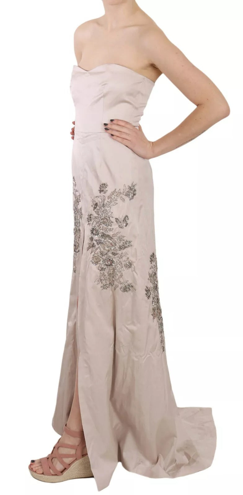 A beige sequined dress with a flared skirt and floral embroidery