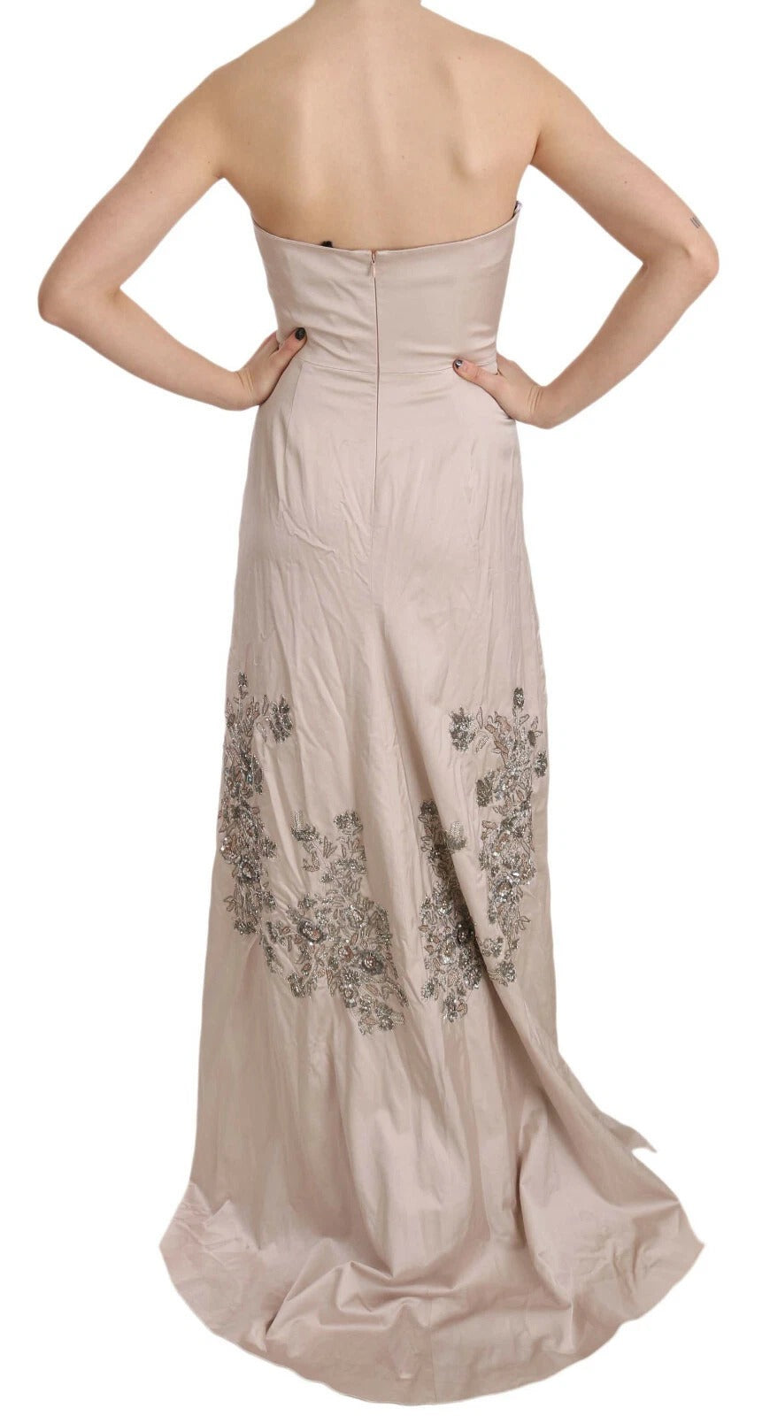 A beige sequined dress with floral embroidery and a flared skirt