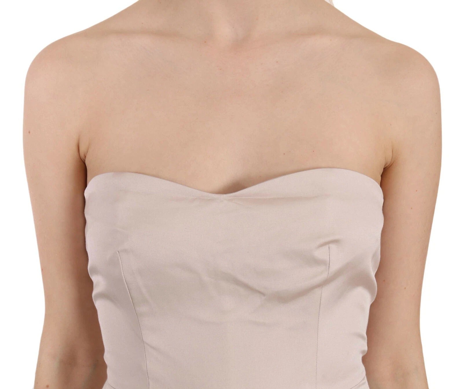 A beige sequined dress with a flared skirt and a fitted bodice