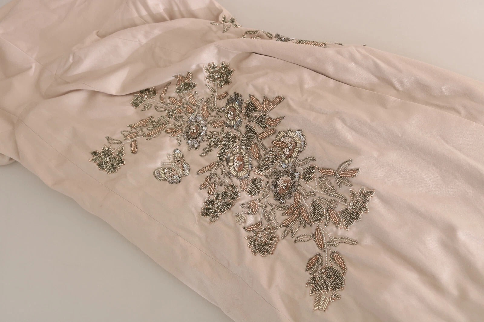 A beige sequined flower flare ball gown dress with embellishments
