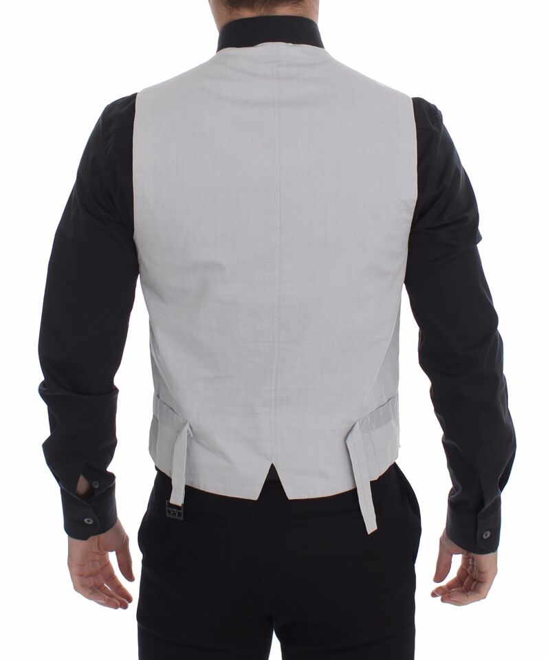 A beige silk blend vest with a formal design