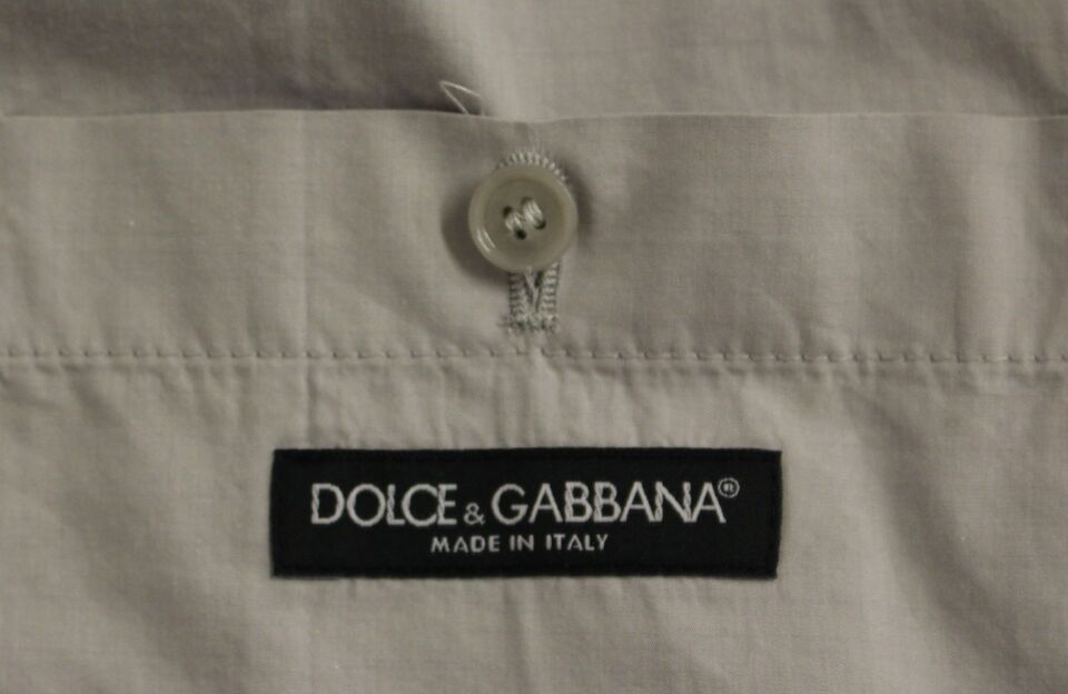 A beige silk blend dress vest from Dolce & Gabbana