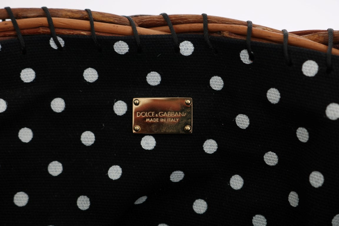 Black polka dot fabric with a gold brand label