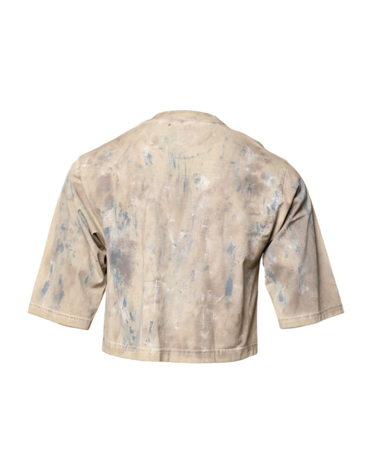 Old worn jacket with paint splatters on back