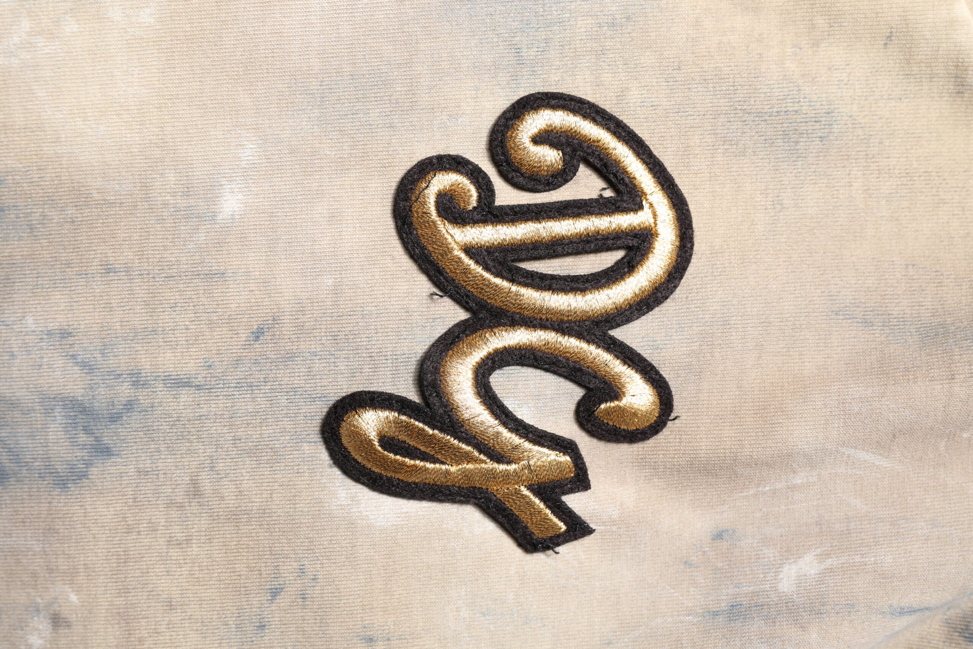 Embroidered initials on fabric