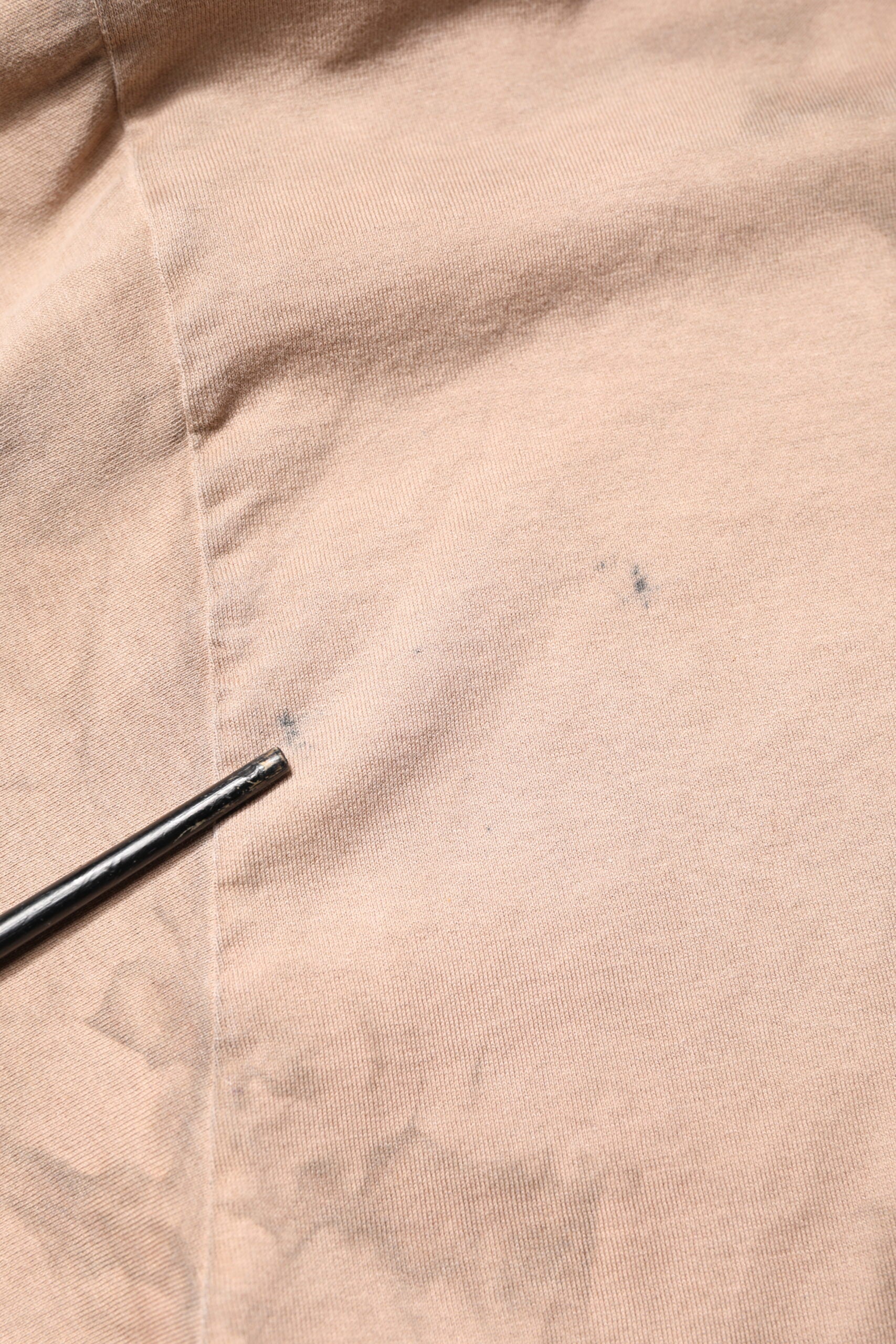Black pen mark on fabric