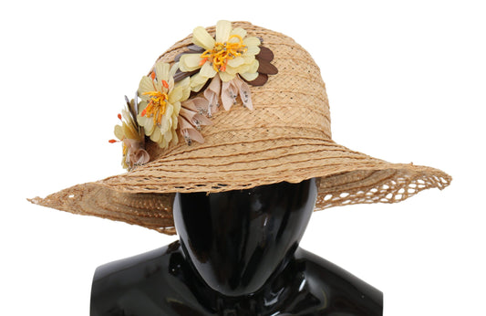 Straw hat with floral embellishment on top