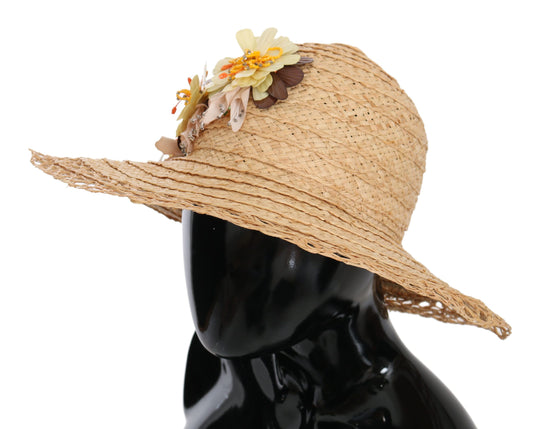 Straw hat with floral embellishment on top