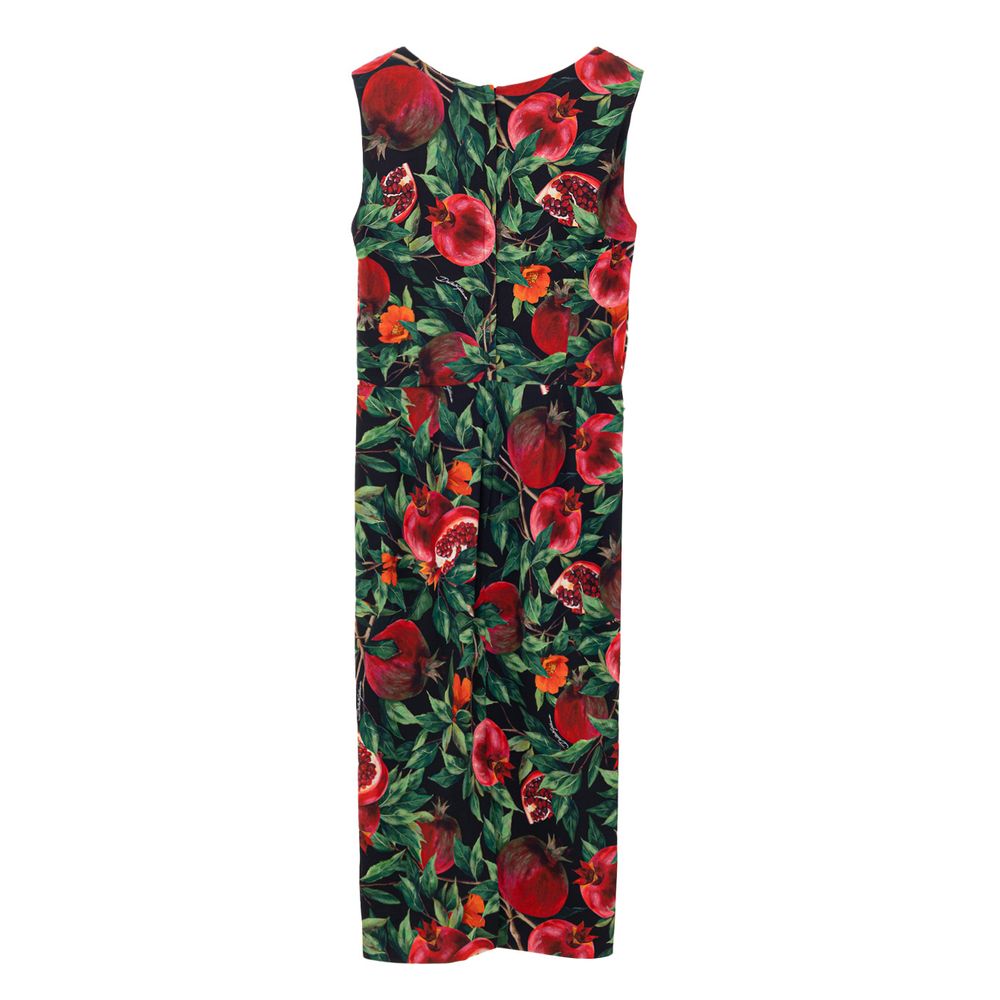 A long dress with a bicolor design featuring red flowers on a black background