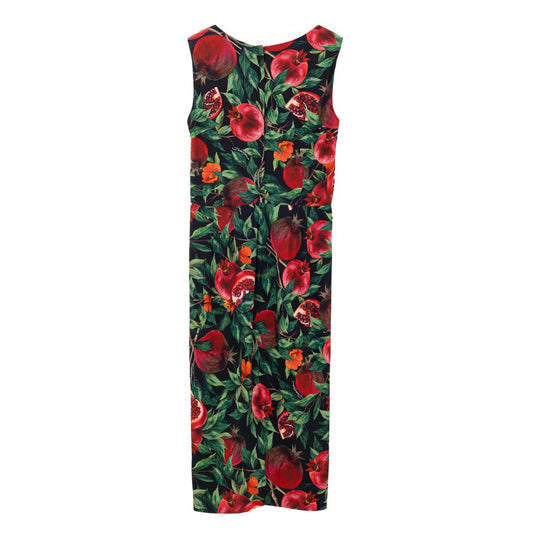 A long dress with a bicolor design featuring red flowers on a black background