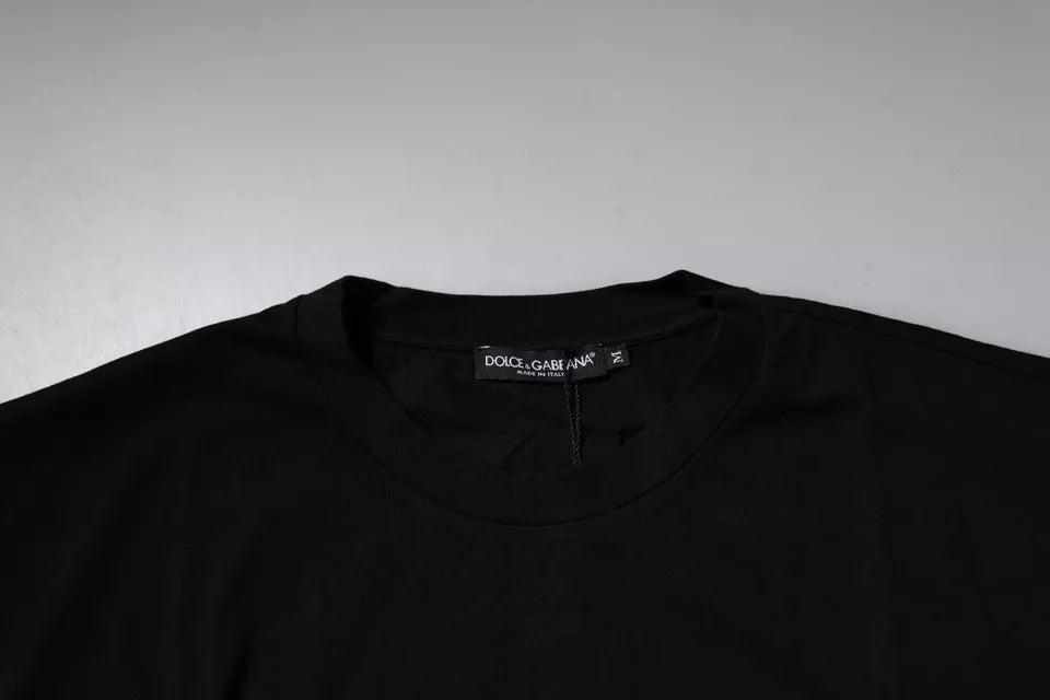 Black long sleeve shirt on hanger