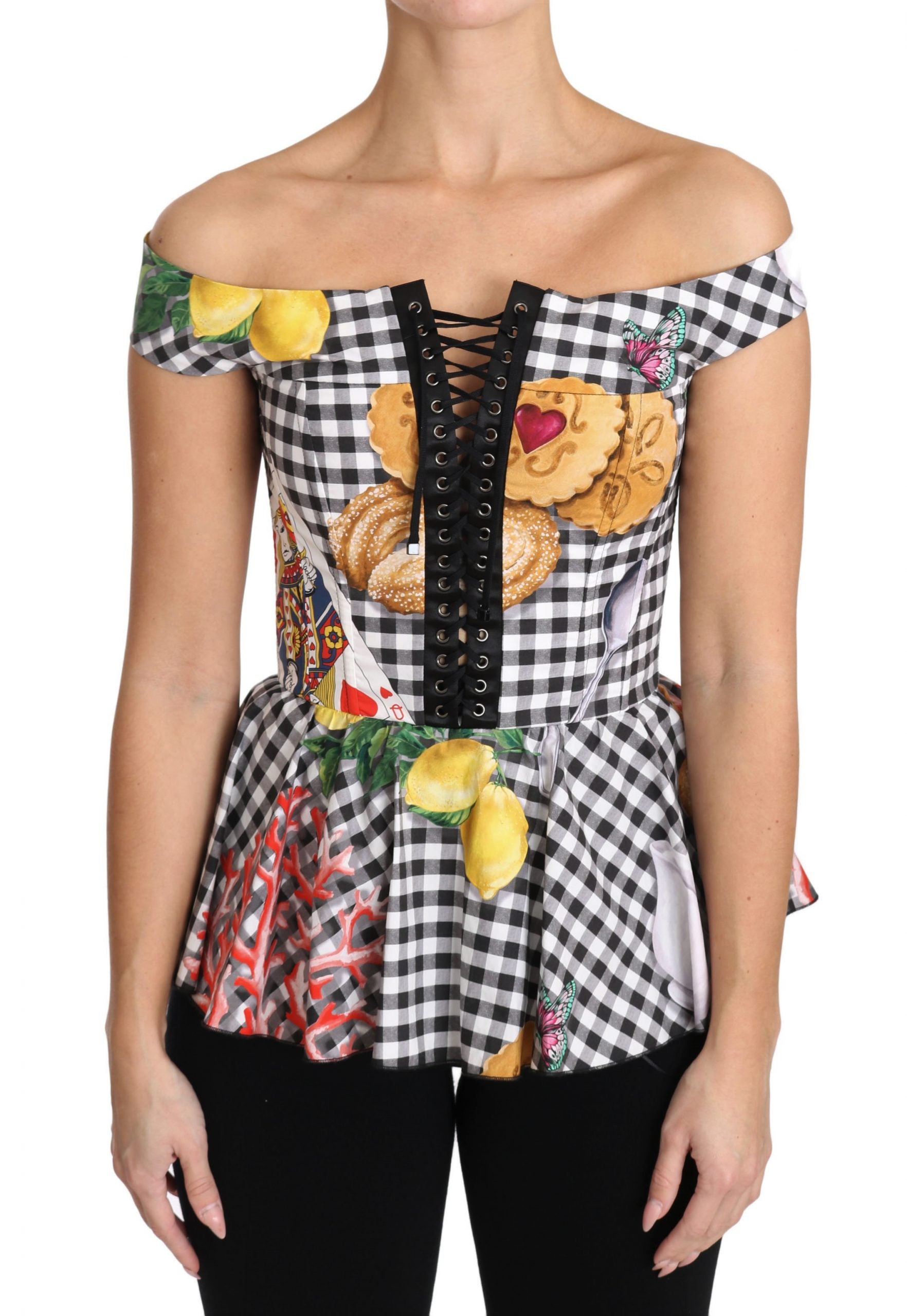 Woman wearing a floral patterned blouse with ruffled sleeves