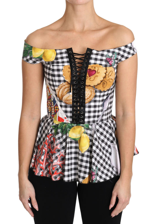 Woman wearing a floral patterned blouse with ruffled sleeves