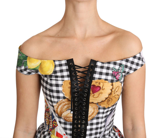 Black and white checkered dress with embroidered cookies on bodice