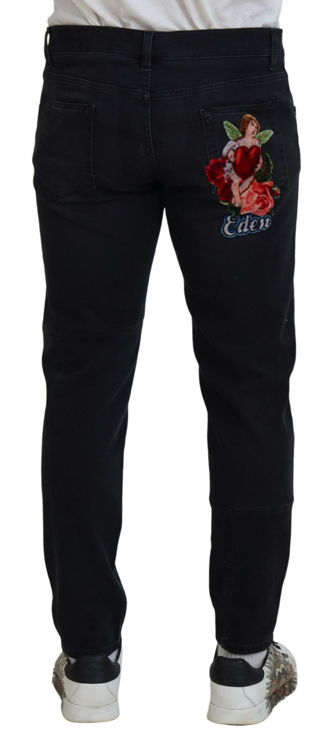 Black jeans with floral embroidery on thigh