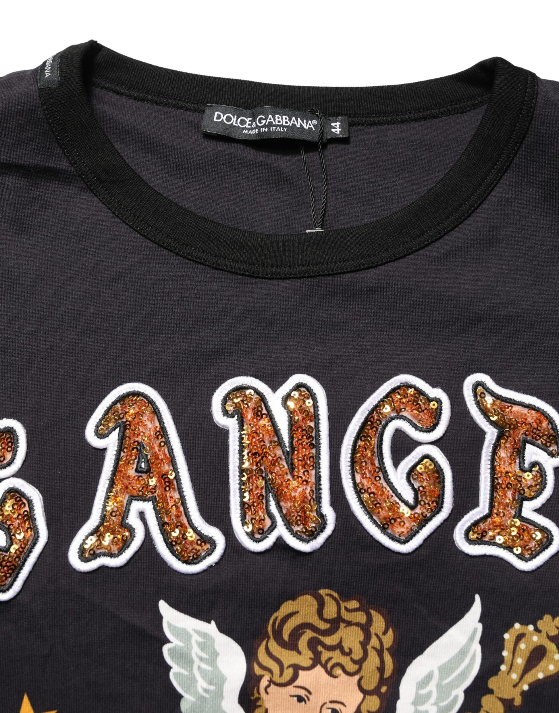 A black angel print crew neck t-shirt with glittery text and design