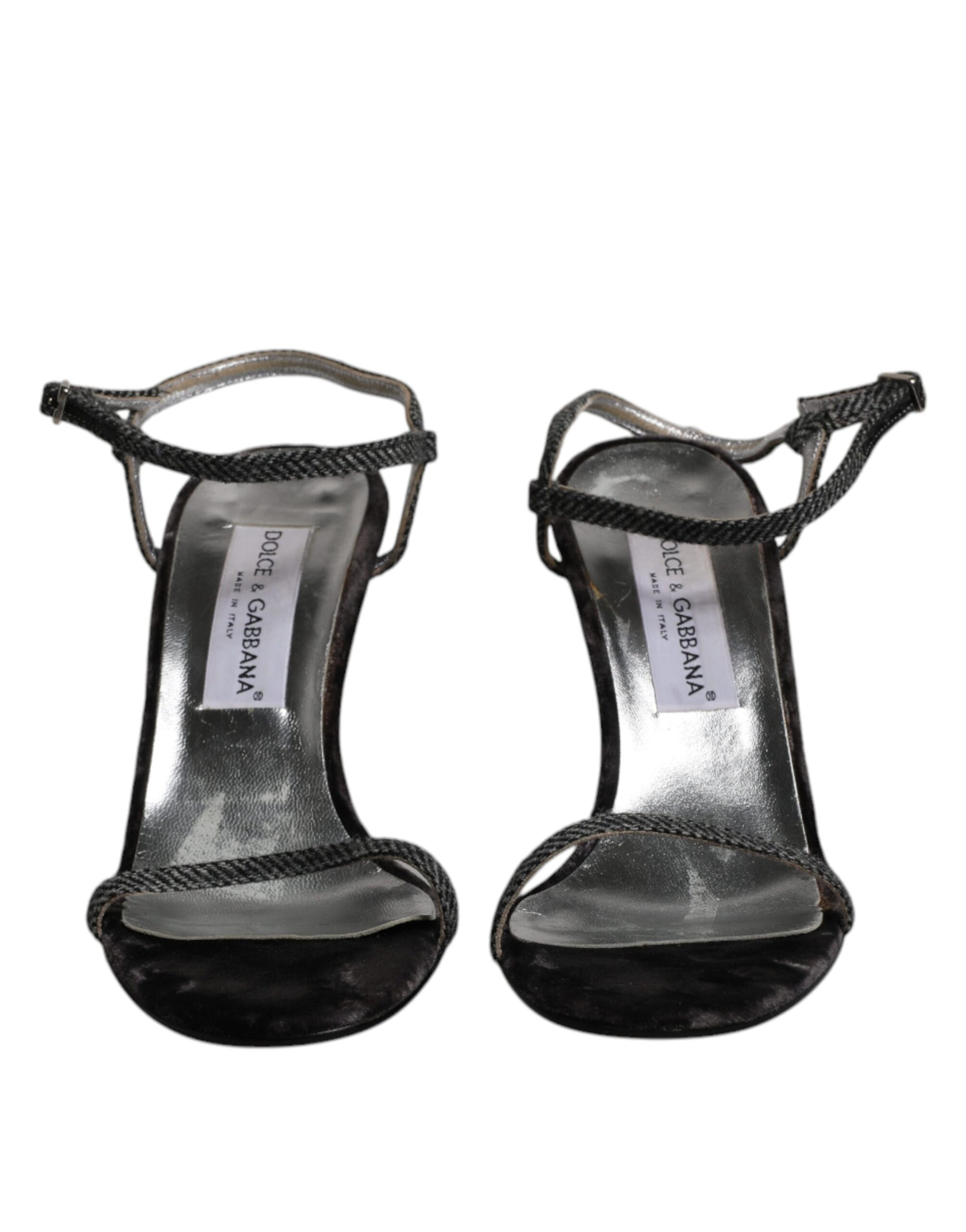 Pair of black high heel shoes with straps