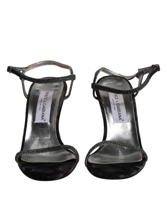 Pair of black high heel shoes with straps
