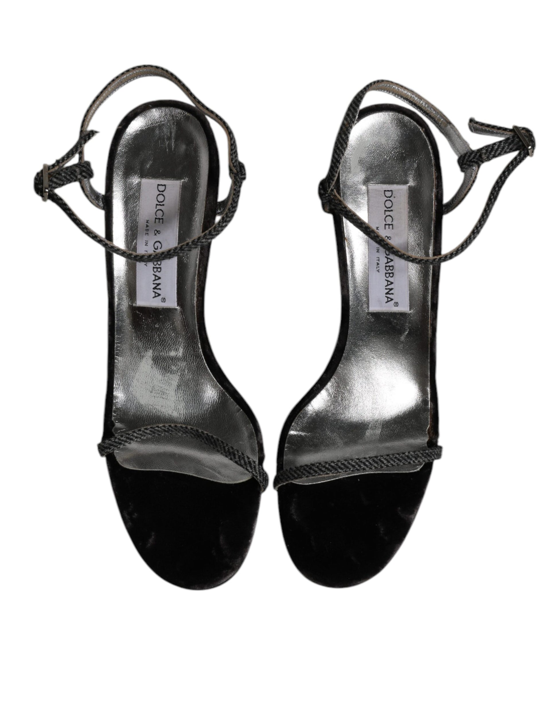Pair of women's silver glittery high heel sandals