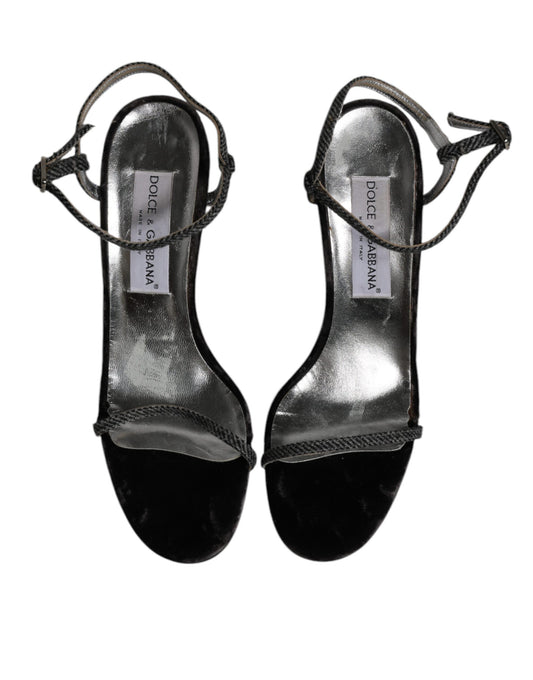 Pair of women's silver glittery high heel sandals