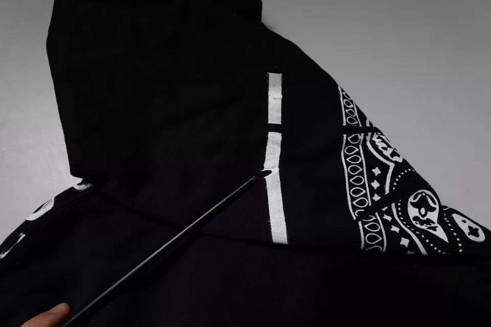 Black bandana with white skull and crossbones design