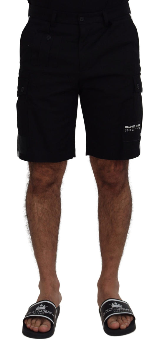 Man wearing black shorts and flip flops
