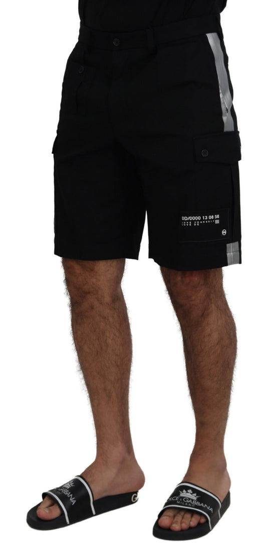 Man wearing black swim trunks