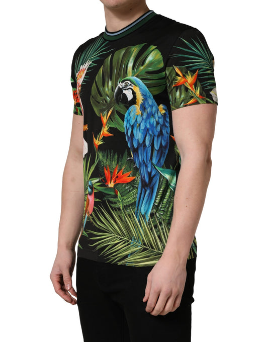 The shirt features a tropical print with parrots and palm trees