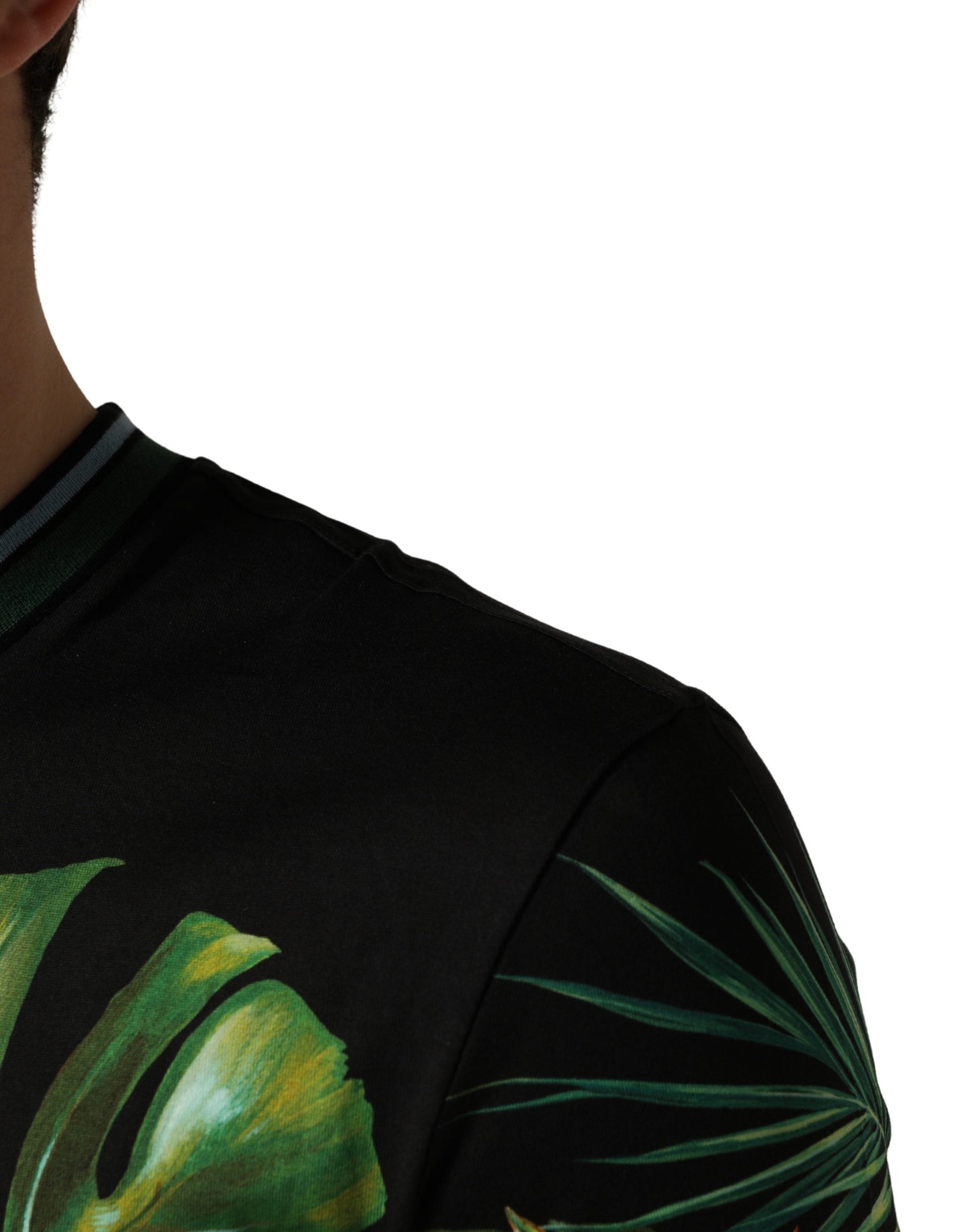 Black sleeveless top with palm leaf print